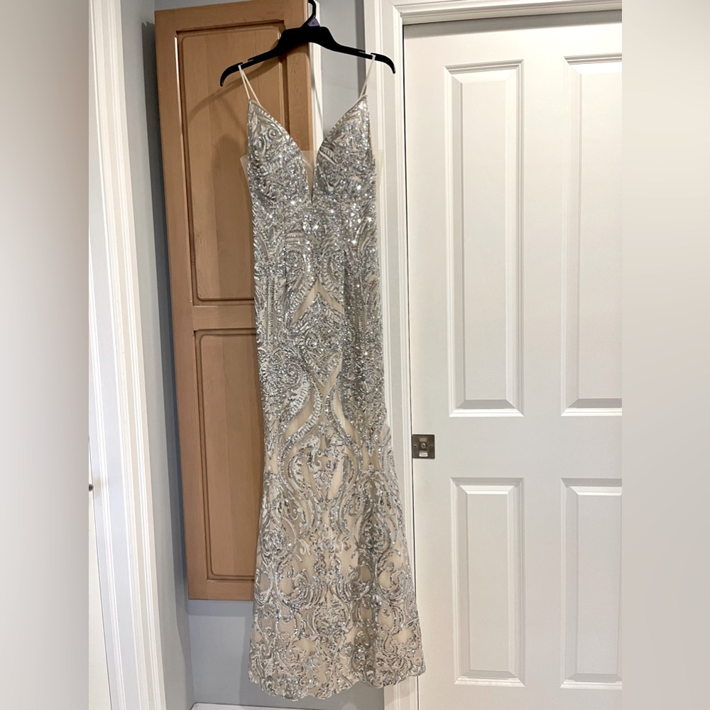 One of a kind Sheri Hill Prom Dress! Has been worn one time, in great condition.